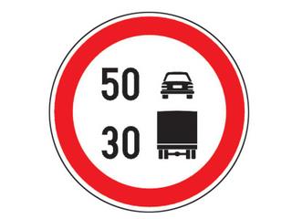 Va aflati la volanul unui autocamion si intalniti indicatorul alaturat. in aceasta situatie puteti folosi: